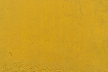 Yellow rough concrete wall texture background. Yellow cement vintage abstract background. Empty wall space for text.