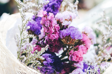 Obraz premium Violet flower bouquet in vintage style.