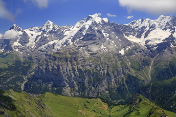 Summer in the Swiss Alps in Murren area, overlooking the Eiger, Monch and the Jungfrau summits