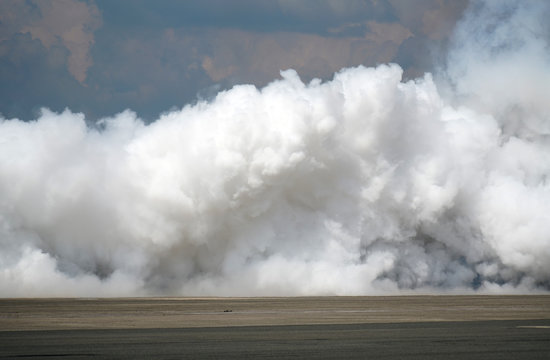 close up on white smoke during explosion