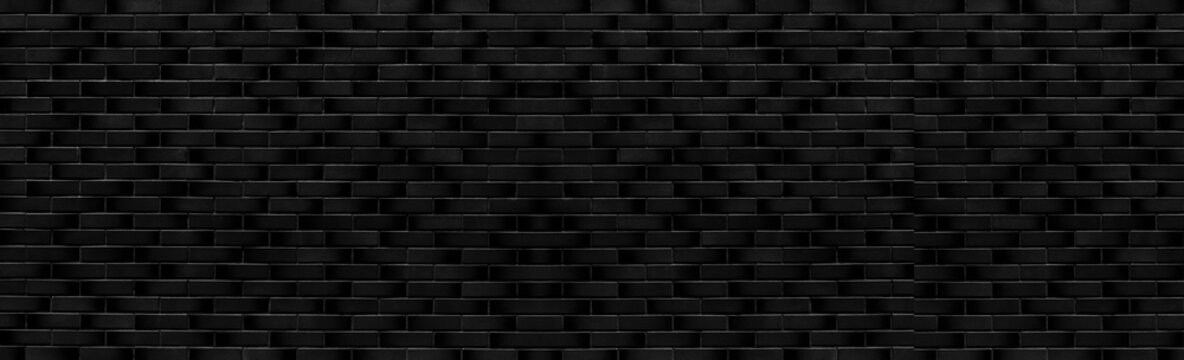 Panorama of Black modern stone wall pattern and background