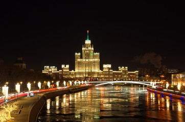 Night view of the Moskvoretskaya and Raushskaya embankments. High-rise building on Kotelnicheskaya embankment, Moscow, Russia