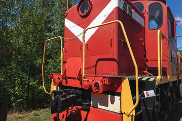 Frontal view of old red locomotive