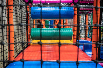 Kids playground for gym with slide and maze in kindergarten. Modern children playground indoor.