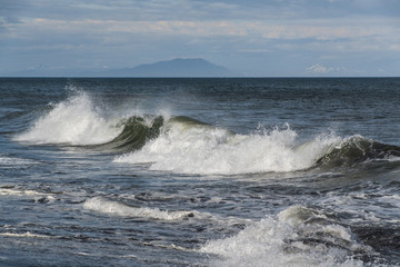 A view of a scenic blue ocean wave