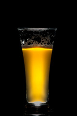 IPA craft beer glass on black background