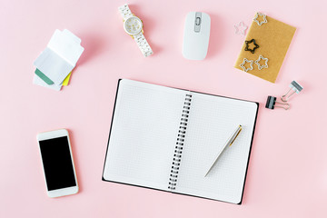 Women workplace notepad personal accessories pink flat lay top view