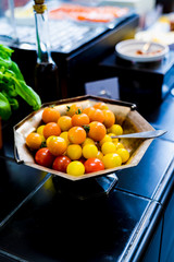 Various tomatoes at a breakfast buffet