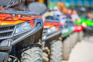 parked in a row several atv quad bikes extreme outdoor adventure concept