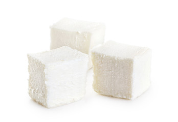 Feta cheese isolated on white background.