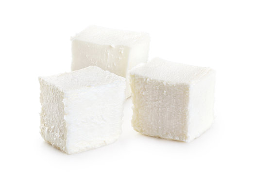Feta cheese isolated on white background.