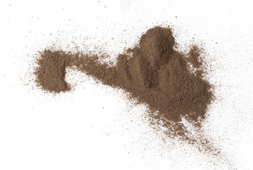 Ground black pepper, powder pile, peppercorn isolated on white background, top view