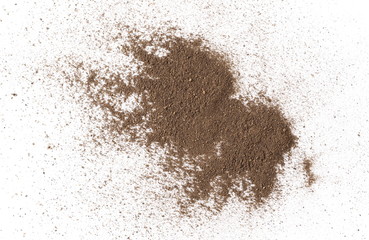 Ground black pepper, powder pile, peppercorn isolated on white background, top view