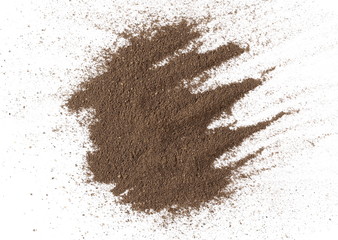 Ground black pepper, powder pile, peppercorn isolated on white background, top view