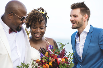 Happy bride and groom in a wedding ceremony at a tropical island