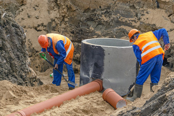 Workers instilled with a sand pipe