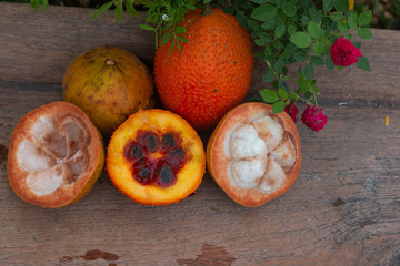 Gac fruits and  santol fruit of Thailand on the wooden table
