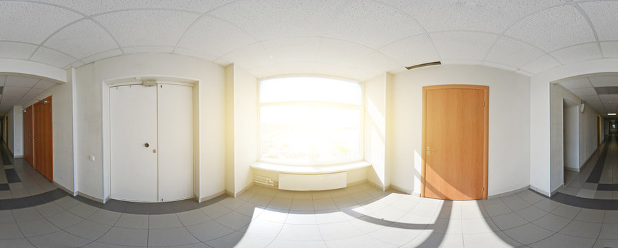 Spherical 360 degrees panorama projection, interior empty long corridor with doors and entrances to different room.