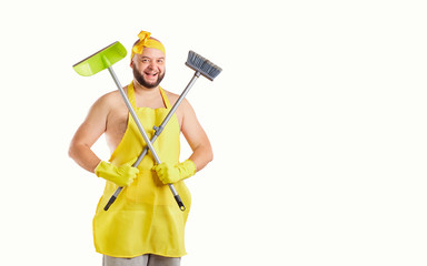 Funny fat cleaning man in an apron on cleaning on a background for text.