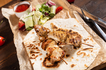chicken kebab with salad