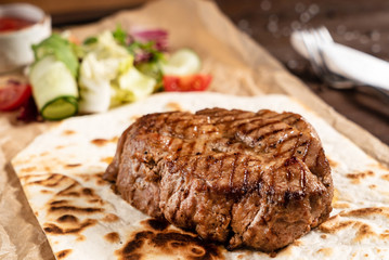 grilled steak with sauce