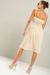 Naklejka premium slim young woman in dress. Fashion photo in studio. 