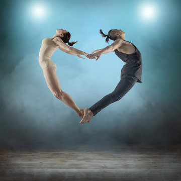 Two person, dancers, woman and man in dynamic action figure pose