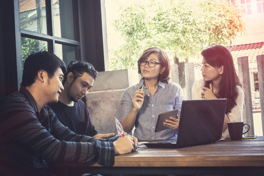 Asian Freelance Teamwork Meeting In Home Office