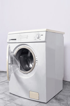 Washing machine with open door at home