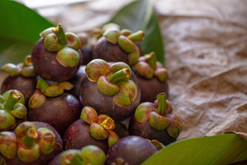 Mangosteens Queen of fruits on wooden table