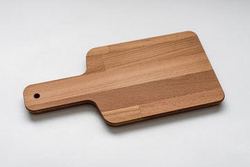 Kitchen accessories wooden cutting board isolated on white