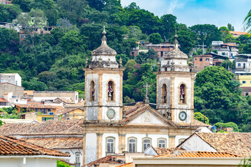 Fototapeta na wymiar View from afar of the towers of the Nossa Senhora do Pilar cathedral, São João del Rei, Minas Gerais, Brazil