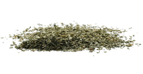 Sliced and cut dry celery leaves pile, isolated on white background