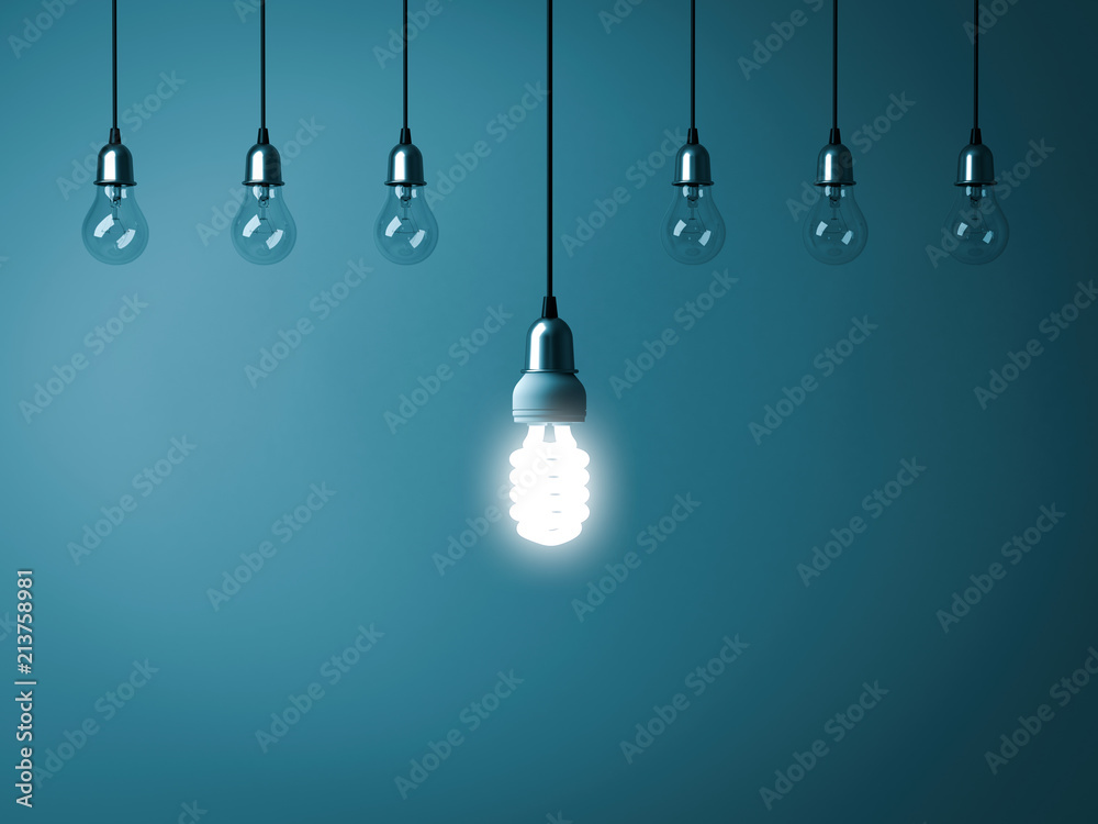 Poster one hanging energy saving light bulb glowing stand out from unlit incandescent bulbs with reflection