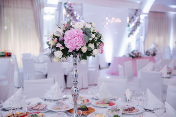 Wedding bouquet in restaurant on the table