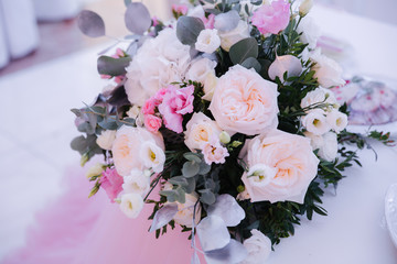 Wedding bouquet in restaurant on the table