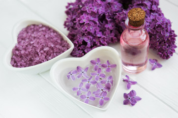 Essential oil with lilac flowers