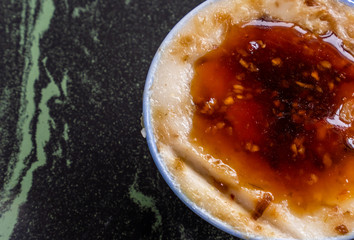 Taiwan's distinctive famous snacks: Savory rice pudding (Wa gui) in a white bowl on stone table, Taiwan Delicacies, Taiwan Street Food