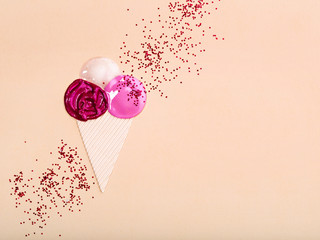 Colorful arrangement of lipgloss in ice-cream.