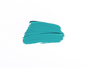 Fototapeta premium Turquoise brush stroke isolated over white background