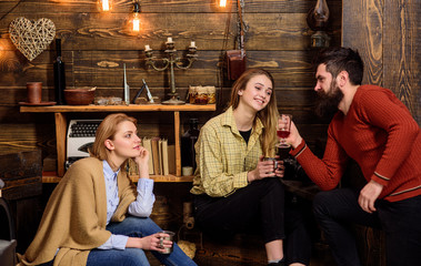 Lady lonely and dreamy spend time with happy couple in love. Couple have fun near lonely woman. Relations and loneliness concept. Woman jealous to couple in love, wooden background