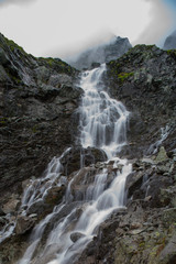 Fototapeta na wymiar Waterfall in Tatra mountains. Morskie oko. 