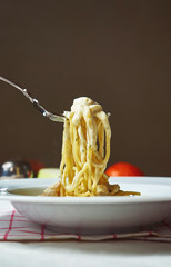 fork with spaghetti carbonara