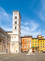 Fototapeta na wymiar Bell tower of San Michele in Foro Basilica in Lucca, Tuscany, Italy.