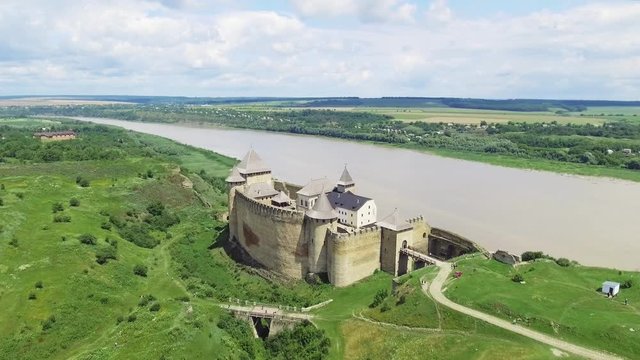Aerial Shot. Old castle near the RIver. Hotin Castle in Ukraine. Eastern Europe
