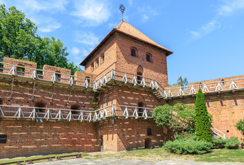 Fototapeta na wymiar Copernicus Tower in complex of buildings forming a Cathedral Hill in Frombork on Vistula Lagoon.