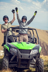 Friends driving off-road with quad bike or ATV and UTV vehicles © FS-Stock