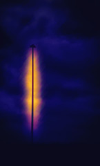 Small street lamp is illuminating the dark night