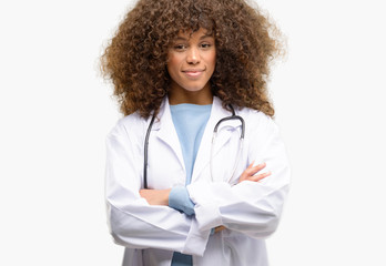 African american doctor woman, medical professional working with crossed arms confident and happy...