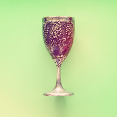 Top view image of jewish wine cup for wine. passover holiday and shabbat concept.